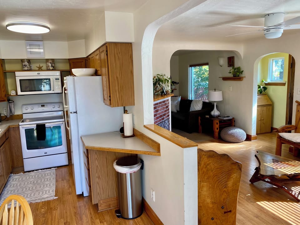 Upstairs kitchen into living room area.