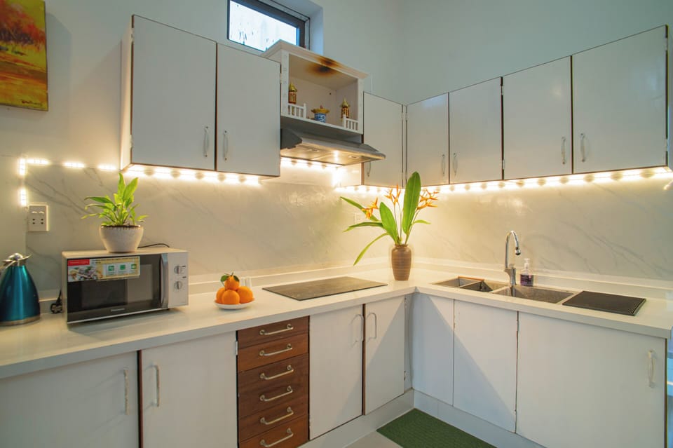 Villa, Balcony, Lake View | Private kitchen | Fridge, electric kettle, rice cooker, griddle
