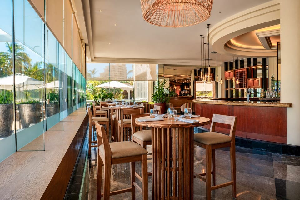 15 bars/lounges, 2 beach bars, poolside bar