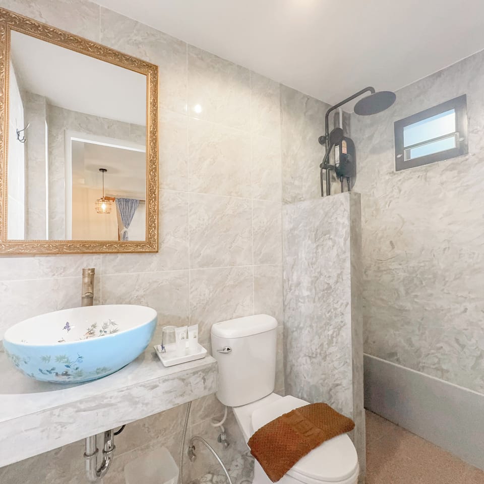 Standard Studio, Balcony, City View | Bathroom | Shower, hair dryer, towels, soap