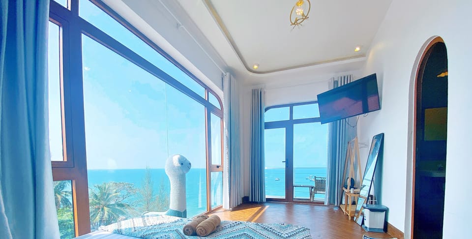 Deluxe Double Room, Sea View | Desk, iron/ironing board, free WiFi, bed sheets