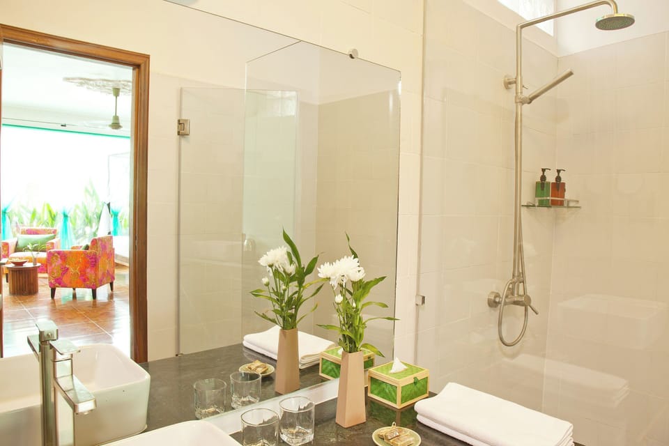 Studio (Adult Only) | Bathroom | Shower, hair dryer, bathrobes, slippers