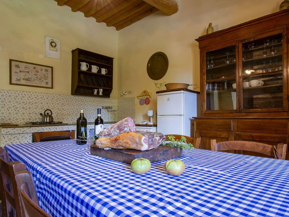 Furniture, Property, Table, Cabinetry, Building, Interior Design, Bottle, Lighting, Picture Frame, Architecture