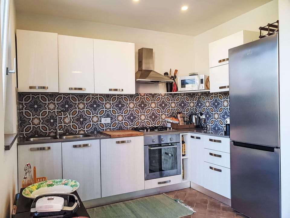 Cabinetry, Countertop, Property, Building, Kitchen, Kitchen Stove, Interior Design, Wood, Flooring, Floor
