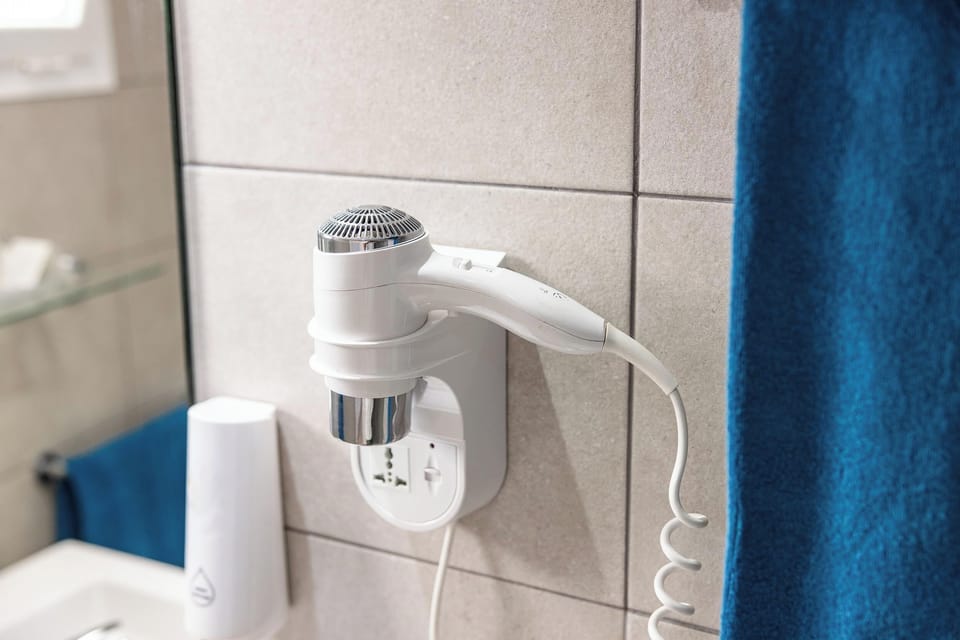 Shower, free toiletries, hair dryer, bathrobes