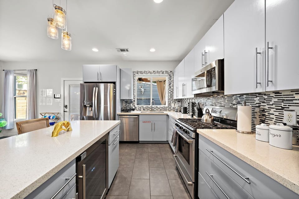 Stainless steel appliances, wine cooler, and coffee bar!