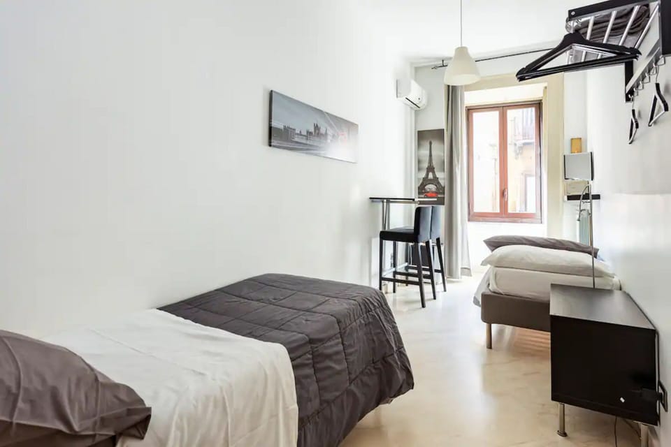 Basic Room, 2 Twin Beds, City View | Minibar, in-room safe, desk, soundproofing