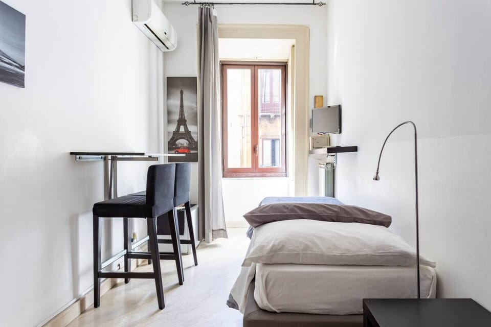 Basic Room, 2 Twin Beds, City View | Minibar, in-room safe, desk, soundproofing