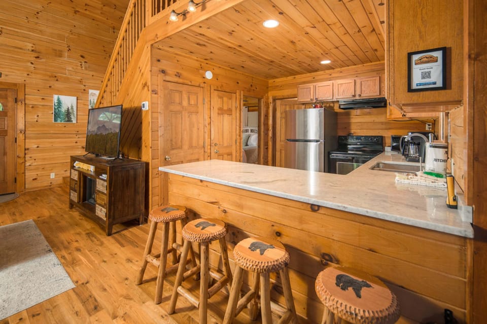Kitchen bar seating for four and open-concept gathering space