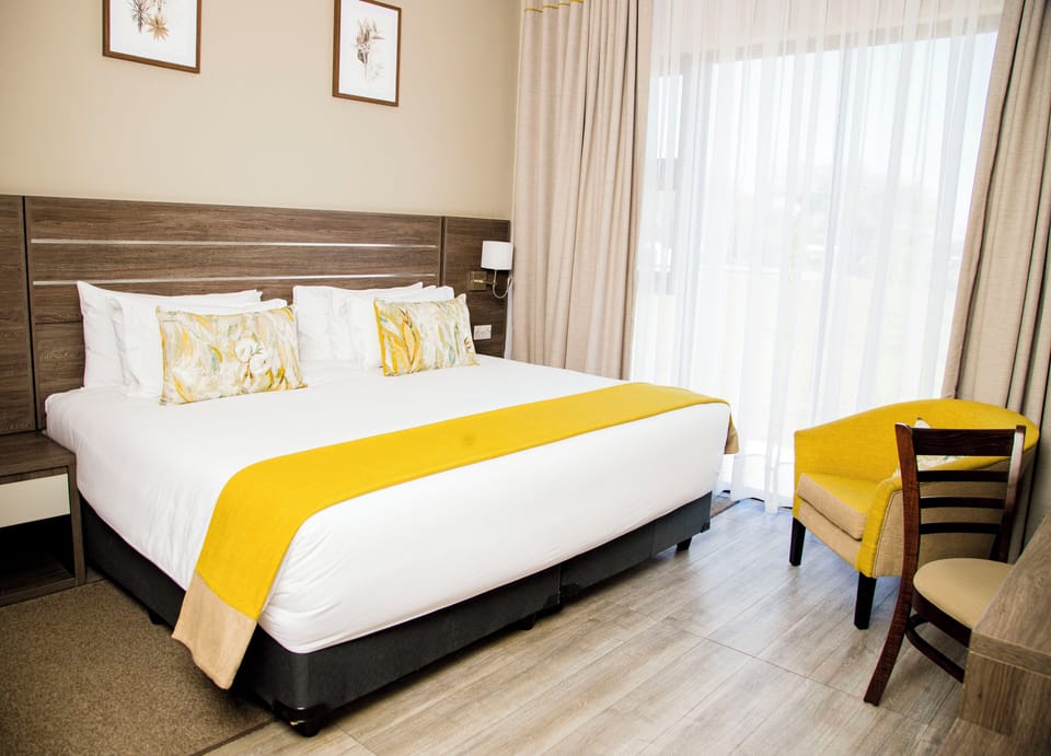 Standard Double Room | Minibar, in-room safe, desk, laptop workspace