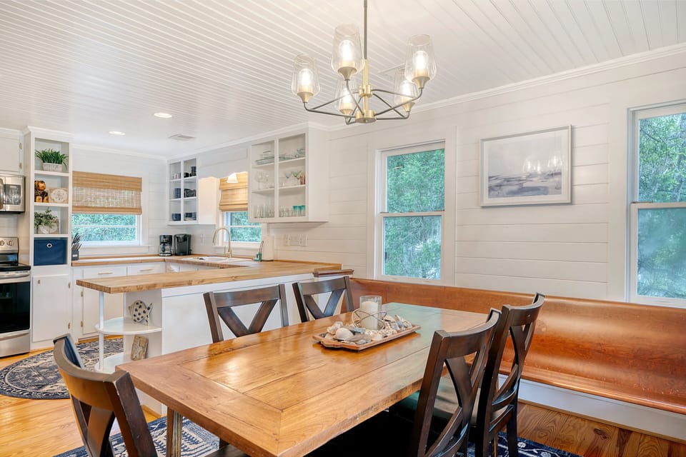 Full dining room upstairs with seating for 6