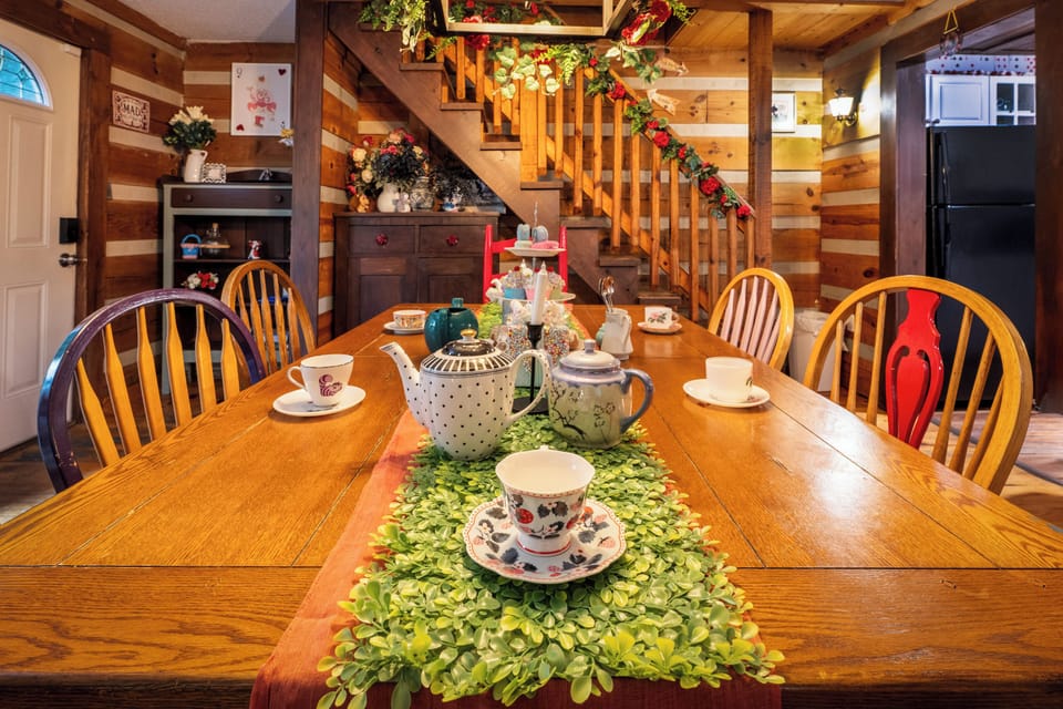 Dining Room: Gather around a charming table adorned with vintage tea sets and vibrant décor!