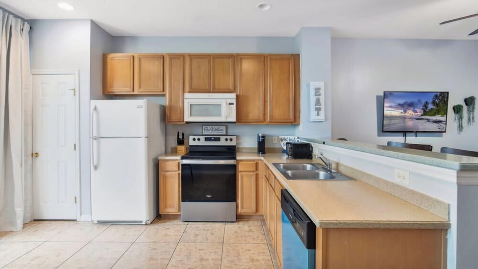 Modern kitchen with stainless steel appliances and ample counter space