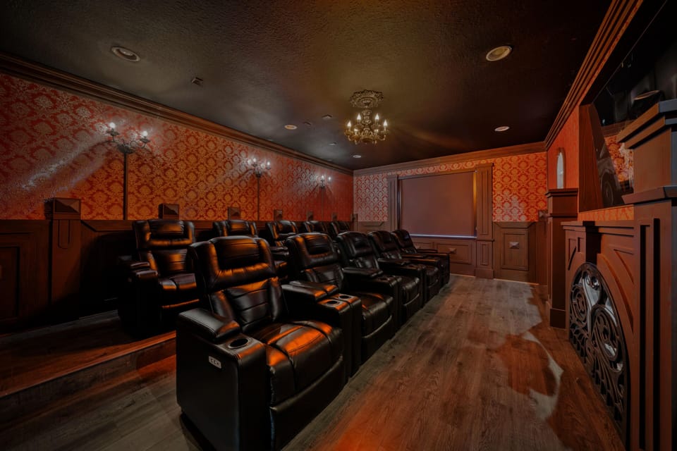 - Private home theater with recliner seating setup
- Orlando vacation rental featuring in-home cinema
- Family-friendly stay with large screen movie fun