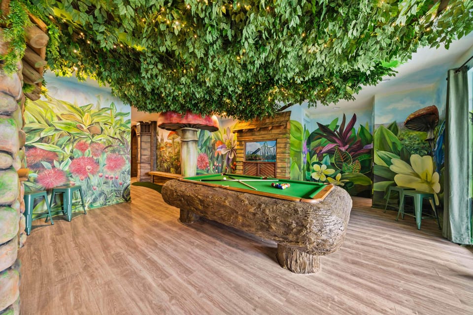- Indoor jungle-themed pool table and mural designs
- Unique Orlando vacation rental with themed rooms
- Family-friendly stay with interactive entertainment
