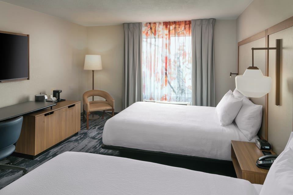 Premium bedding, desk, blackout drapes, iron/ironing board