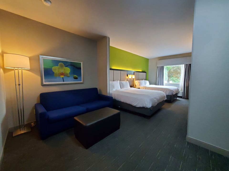 Suite, 2 Queen Beds (Additional Living Area) | Desk, iron/ironing board, free rollaway beds, free WiFi