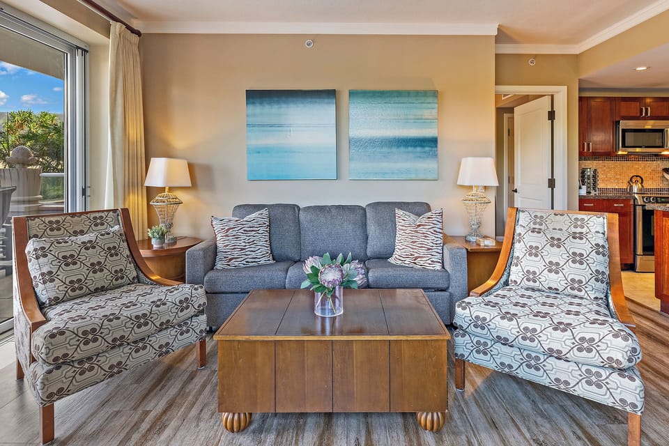 The cozy living area at Honua Kai Konea 232 is perfect for relaxing or planning island adventures.