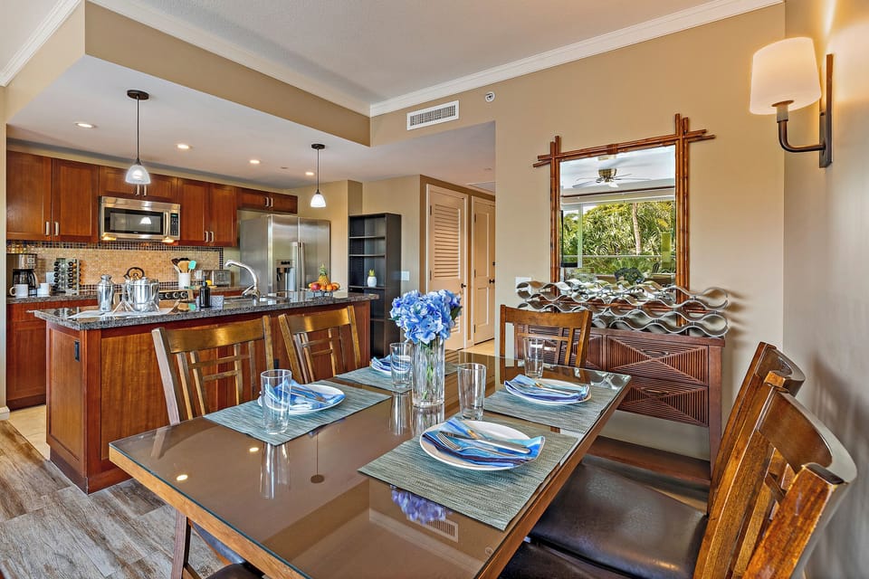Dine in style at Honua Kai Konea 232 with a sleek table and seating perfect for shared meals.
