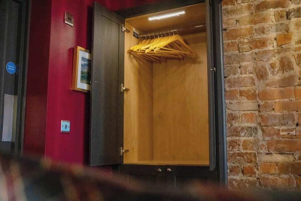 Whether you're working remotely or simply unwinding, the room offers a cosy double bed and a dedicated workspace in a calm and comfortable setting.