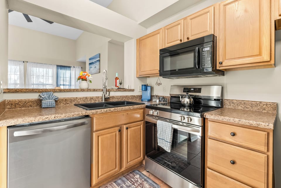 Fully equipped kitchen with all the essentials for cooking, and dining