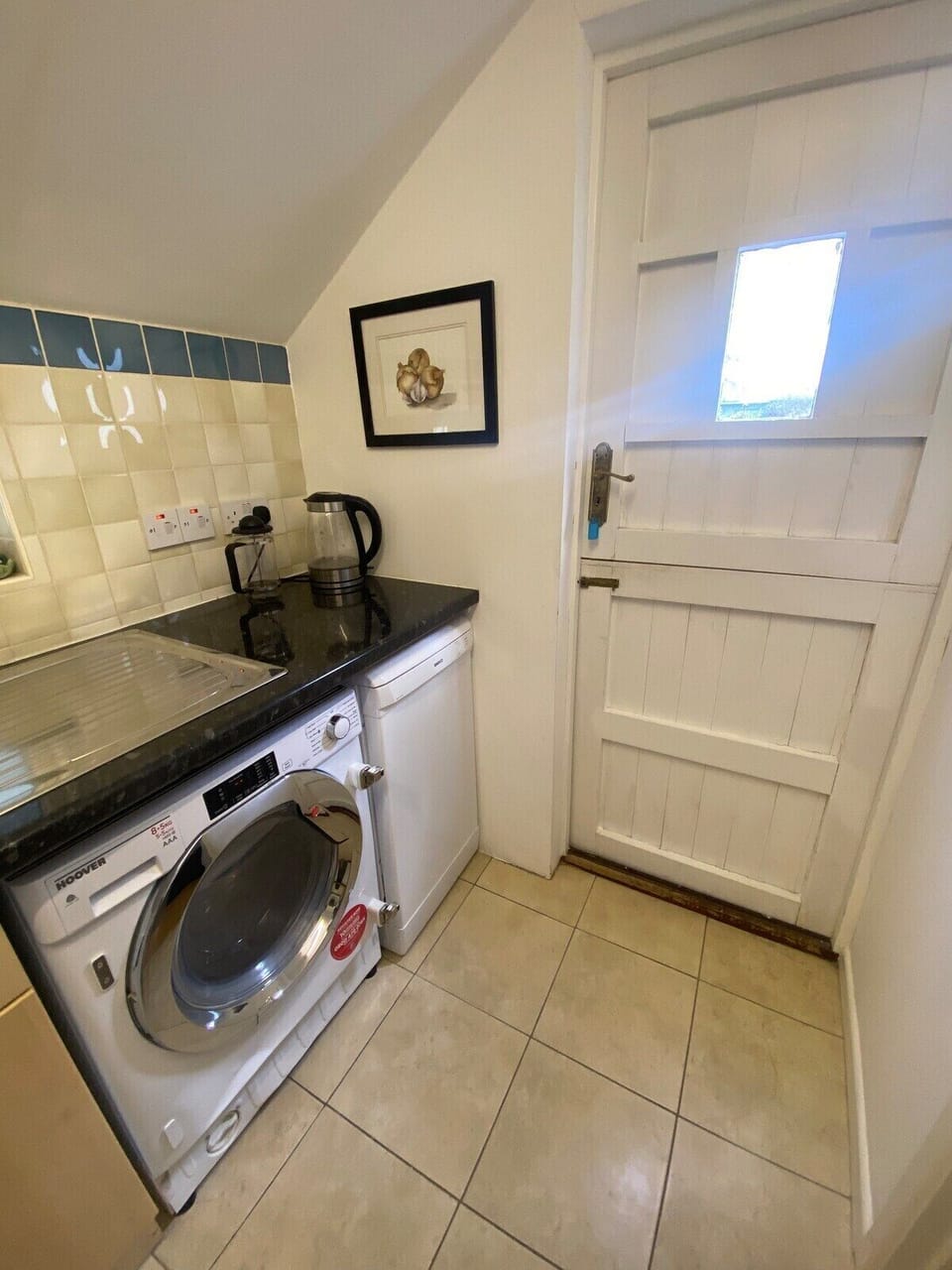 Small kitchen area - with counter top oven and hob