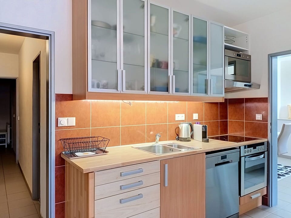 Countertop, Kitchen, Major Appliance, Kitchen Appliance, Wood, Cabinetry, Flooring, Interior Design, Floor, Furniture