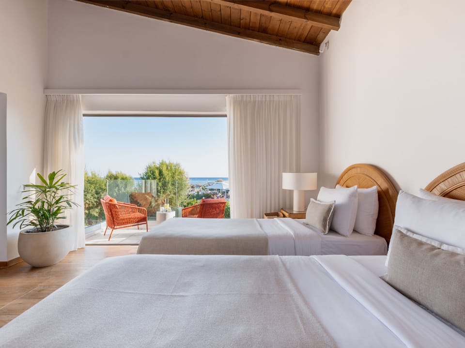 Two-bedroom Bungalow Suite Sea View | Minibar, in-room safe, free WiFi, bed sheets