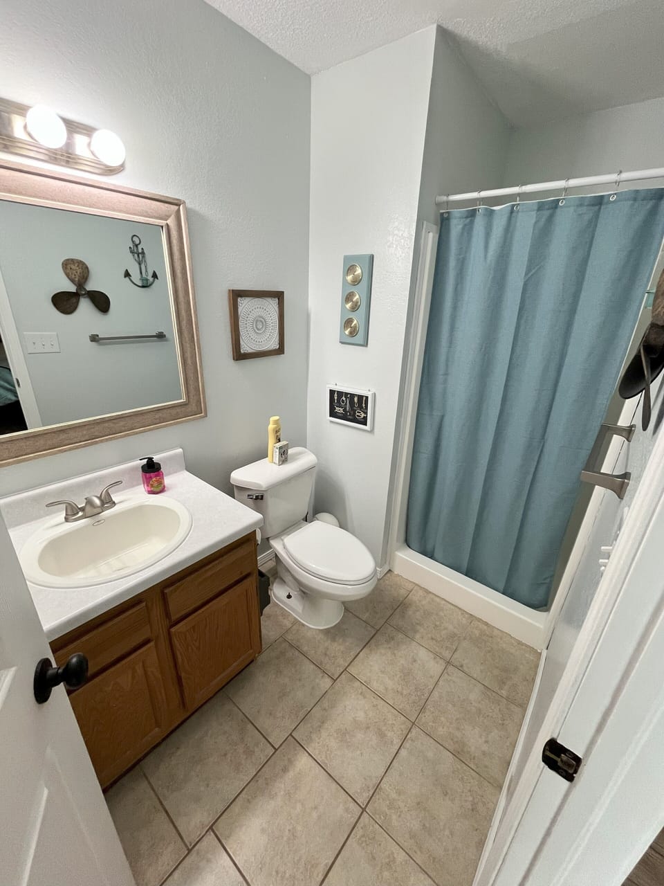 Full master bathroom with shower.