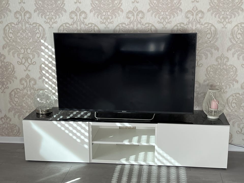 Classic Apartment | Living area | Flat-screen TV