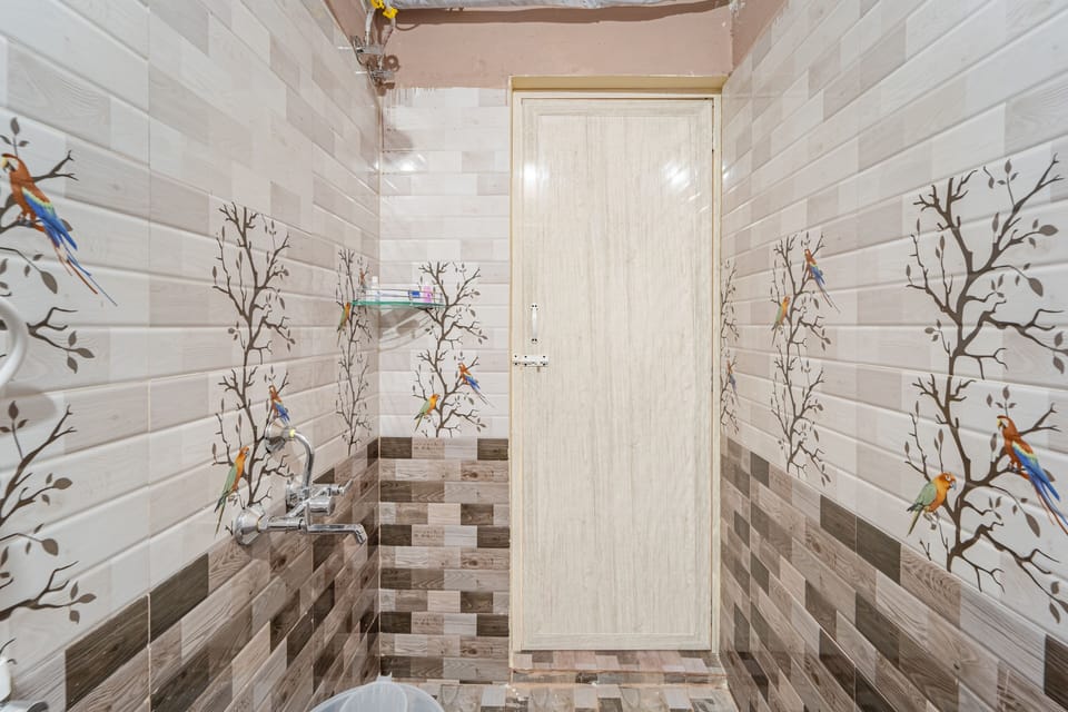 Deluxe Double Room, Garden View | Bathroom | Shower, towels, soap, shampoo