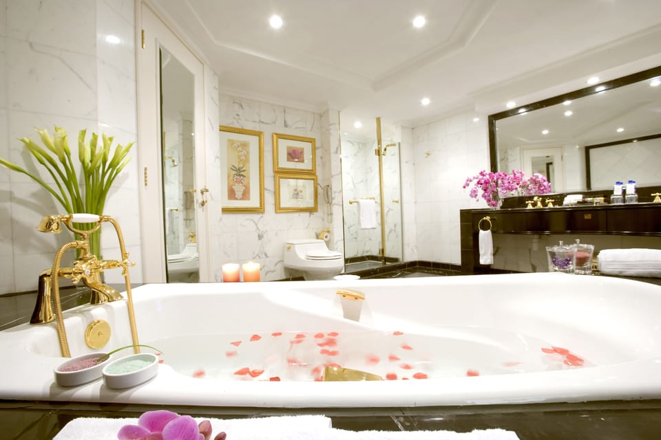 Separate tub and shower, deep soaking tub, designer toiletries