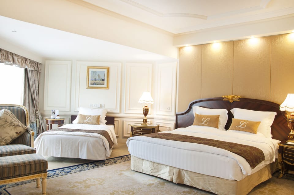 Family Triple Room | Down comforters, minibar, in-room safe, desk