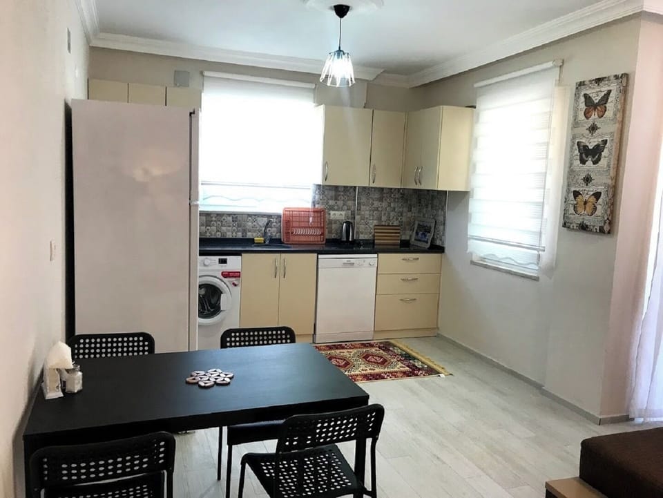 Family Apartment, Balcony, Garden View | Private kitchen | Full-size fridge, oven, stovetop, dishwasher