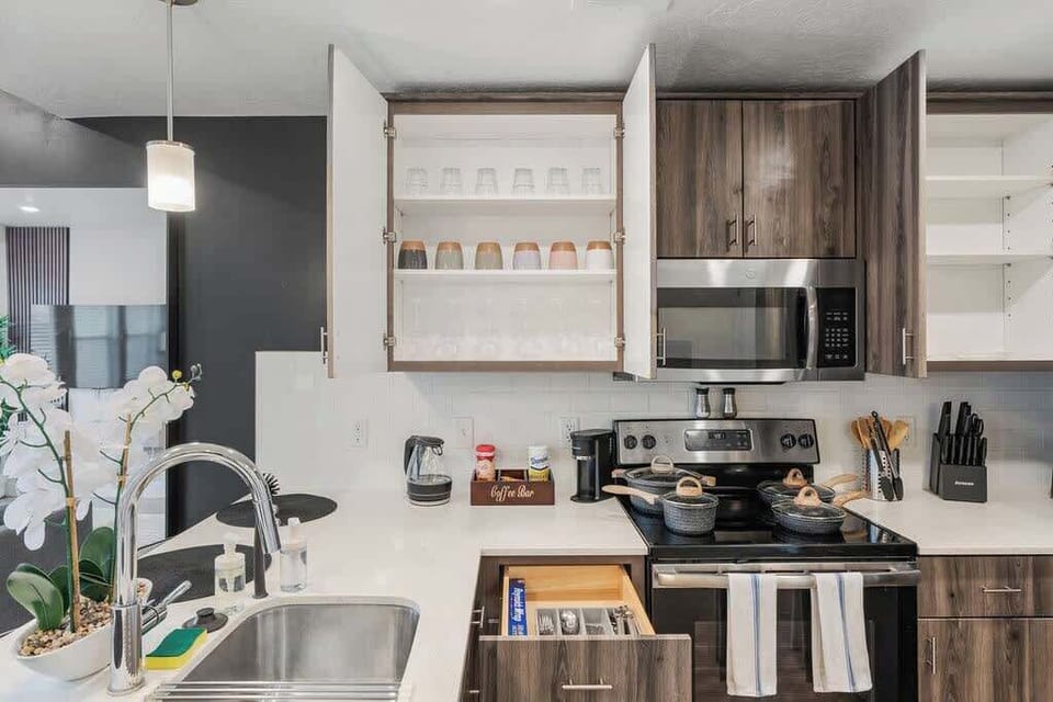 Cook like a pro in our fully-equipped kitchen, complete with an oven, dishwasher, and all the utensils you need.