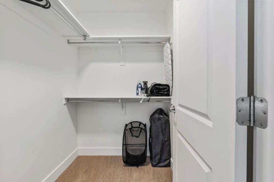 Your wardrobe is in good hands – our walk-in closet includes a flat iron, laundry bag, and plenty of hangers.