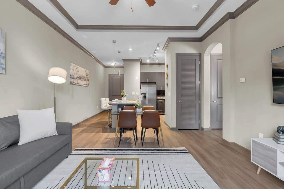 Perfect for socializing, our open-concept layout connects the kitchen, dining, and living room in one inviting space.