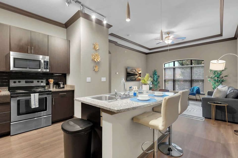 Cook up a storm in the fully equipped kitchen, complete with a stylish bar counter for casual dining.