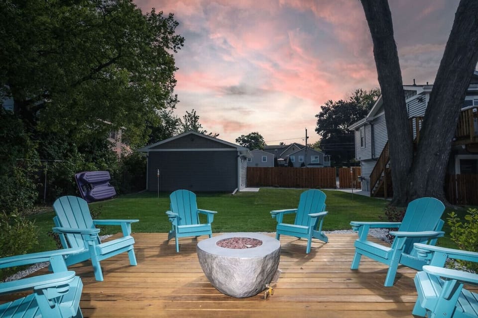 This is the main entertainment area outside on the waterfront deck with natural gas firepit