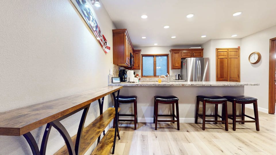 Kitchen bar counter with seating for 3