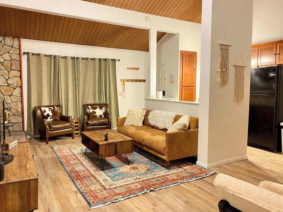 Living room with Apple TV, DVD player, fireplace