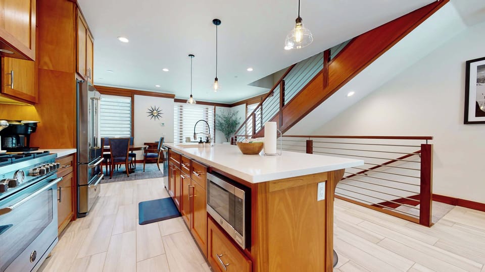 The kitchen is a gourmet’s dream, offering top of the line appliances and sprawling counterspace