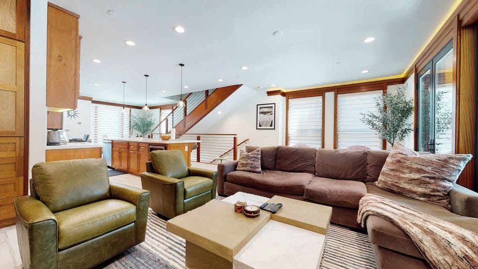Curl up for a movie or enjoy a warming fire in the living room’s gas fireplace