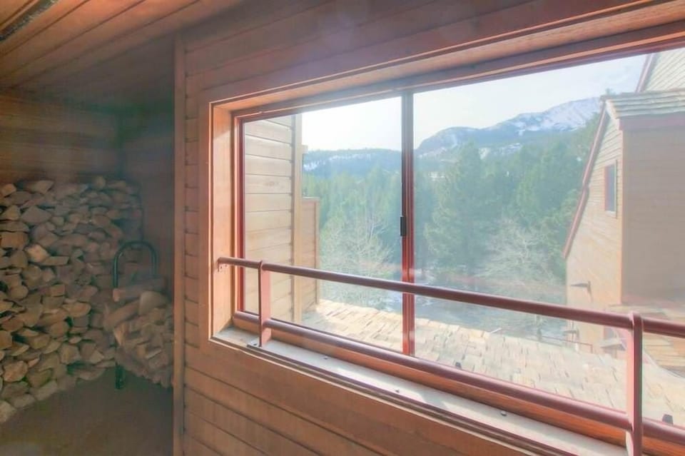 Firewood room with mountain view