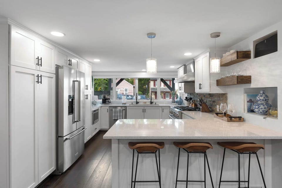 Kitchen with island and bar stools