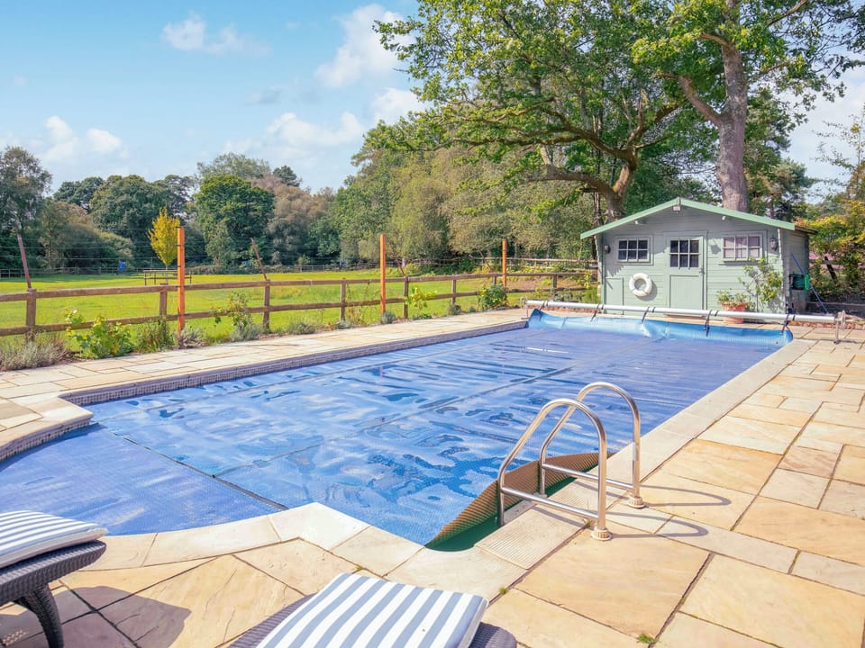 The swimming pool - open during the summer. Please contact property owner for dates. | The Cottage at Dockens Water, Linwood, near Ringwood