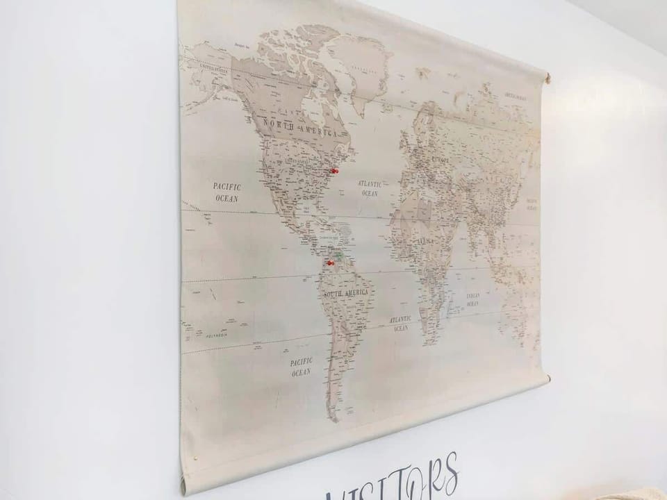 Stylish wall map decor adding character to the cozy living space