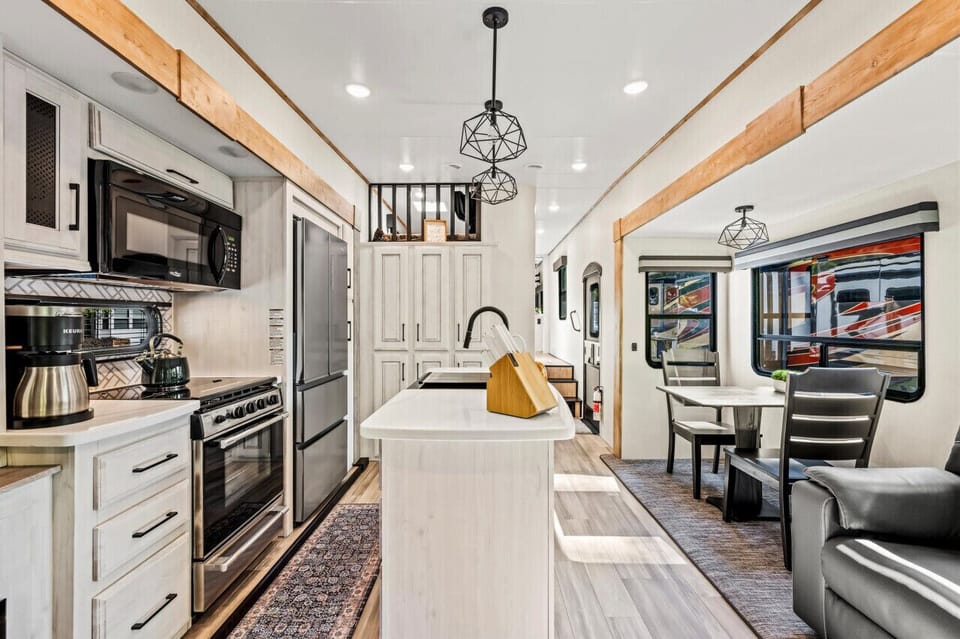 Fully stocked Kitchen with stainless steel appliances