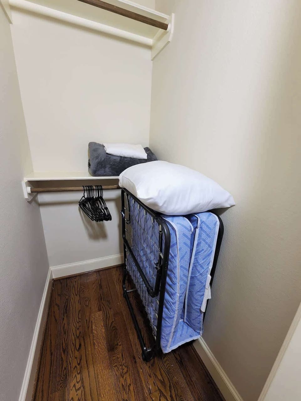 Clean bathroom with essentials and modern towel rack.
