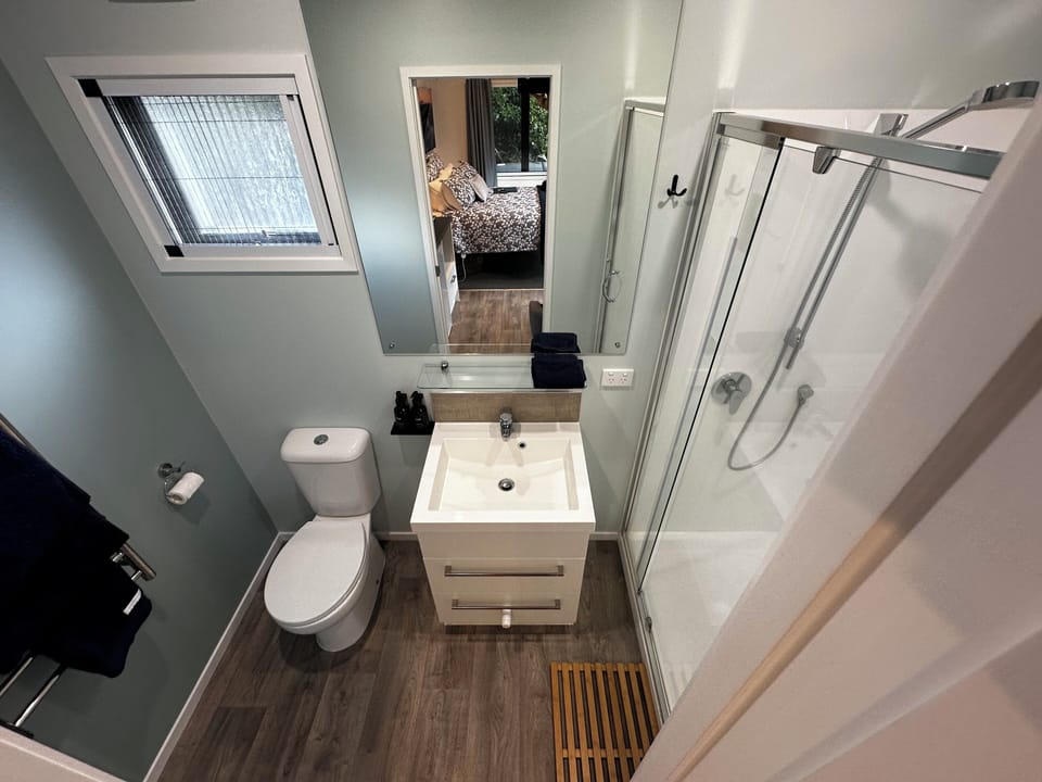 Premium Studio, 1 Queen Bed, River View | Bathroom | Shower, free toiletries, hair dryer, towels
